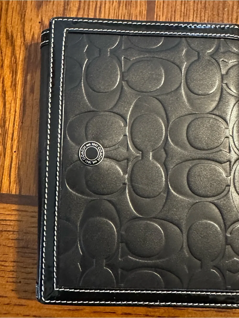 Coach Black Embossed Signature Leather Passport Cover with Silver Accent